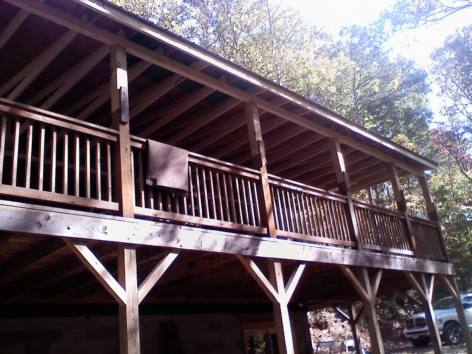 Timber framing under a new elevated porch and deck — Roof Leak Repair in War by Roofing Brothers